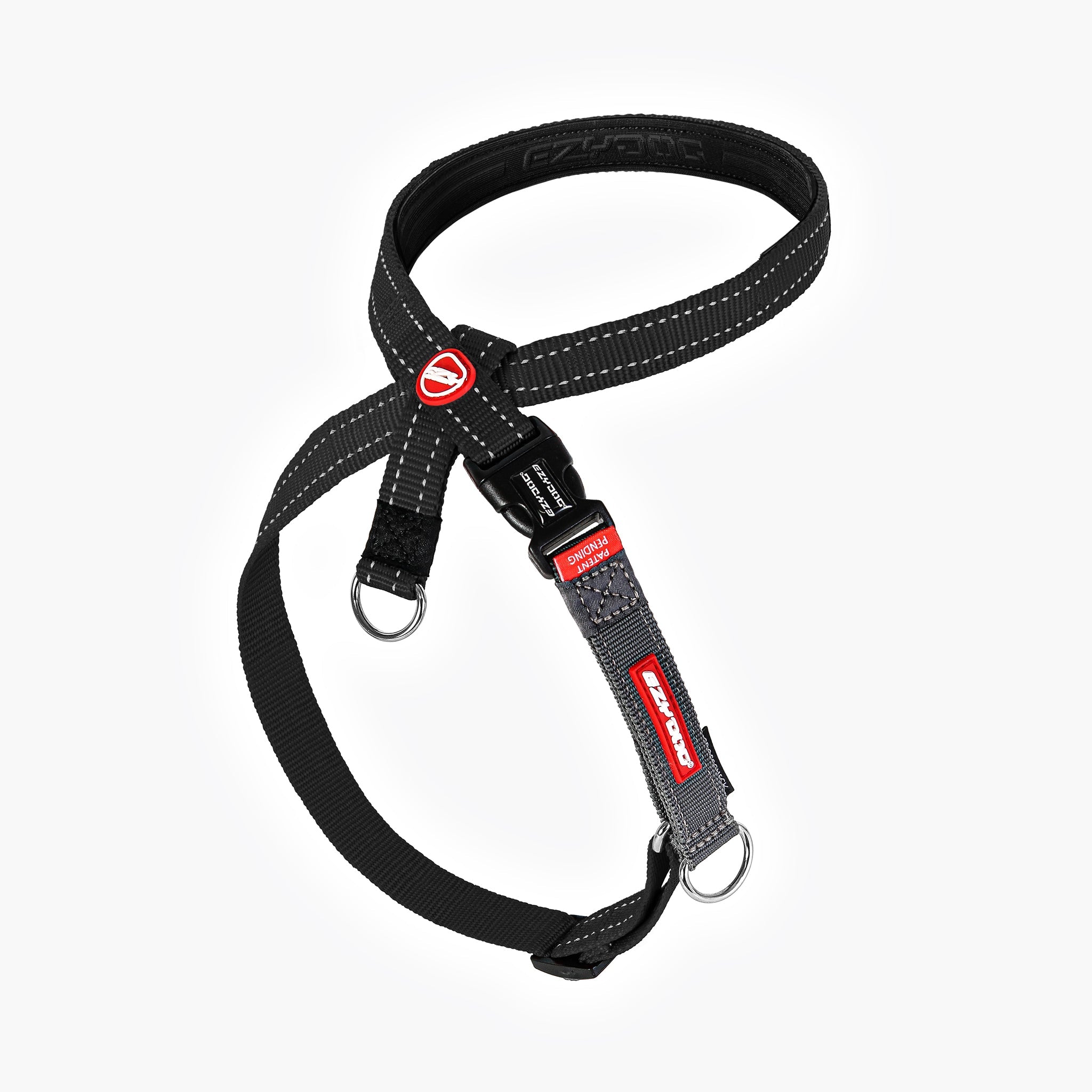 A black Crosscheck 'No Pull' Dog Training Harness with red stitching and the EzyDog brand tag, designed for training and walking dogs with multiple lead attachment points.