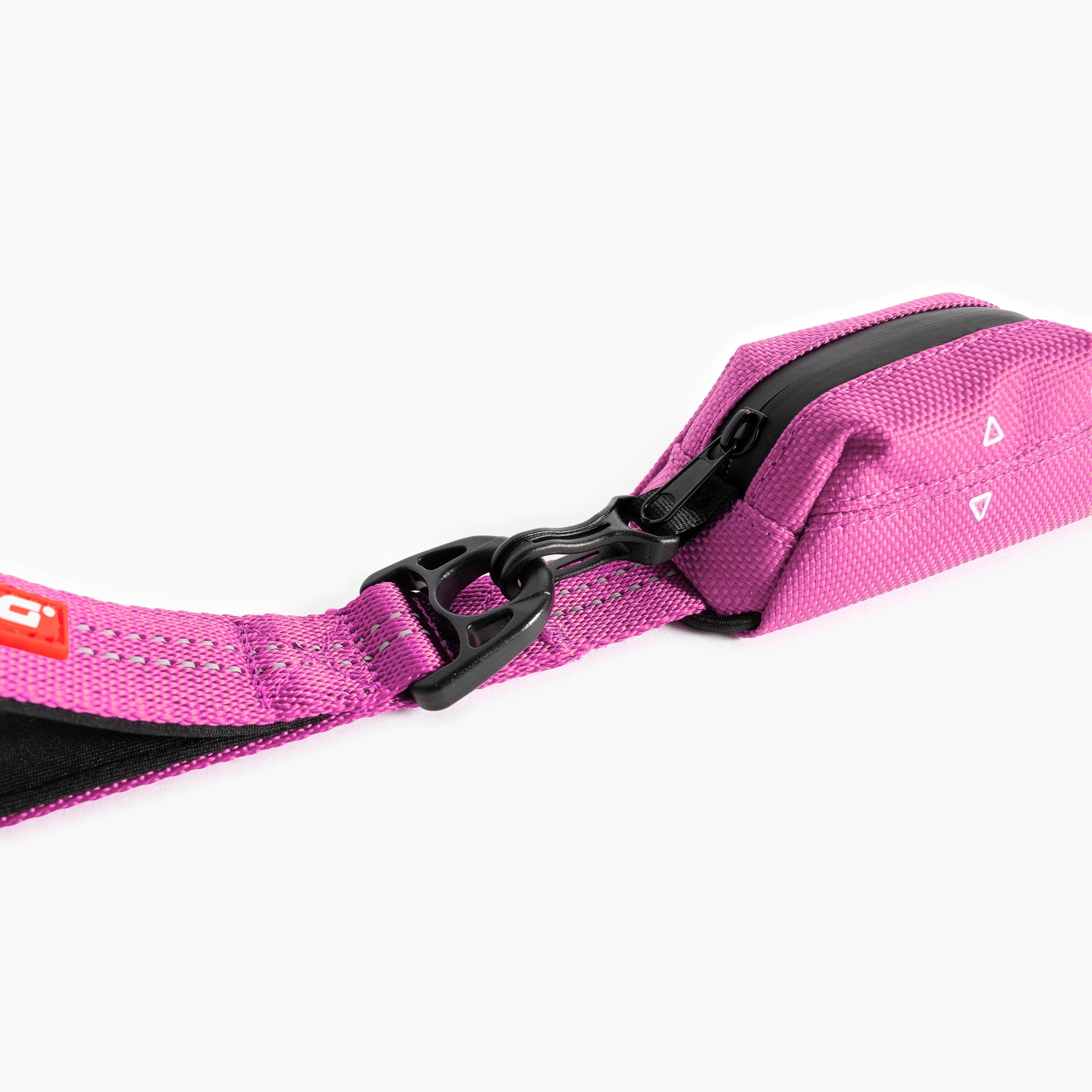 Pink Essential Dog Poop Bag Holder with black clip on a white background