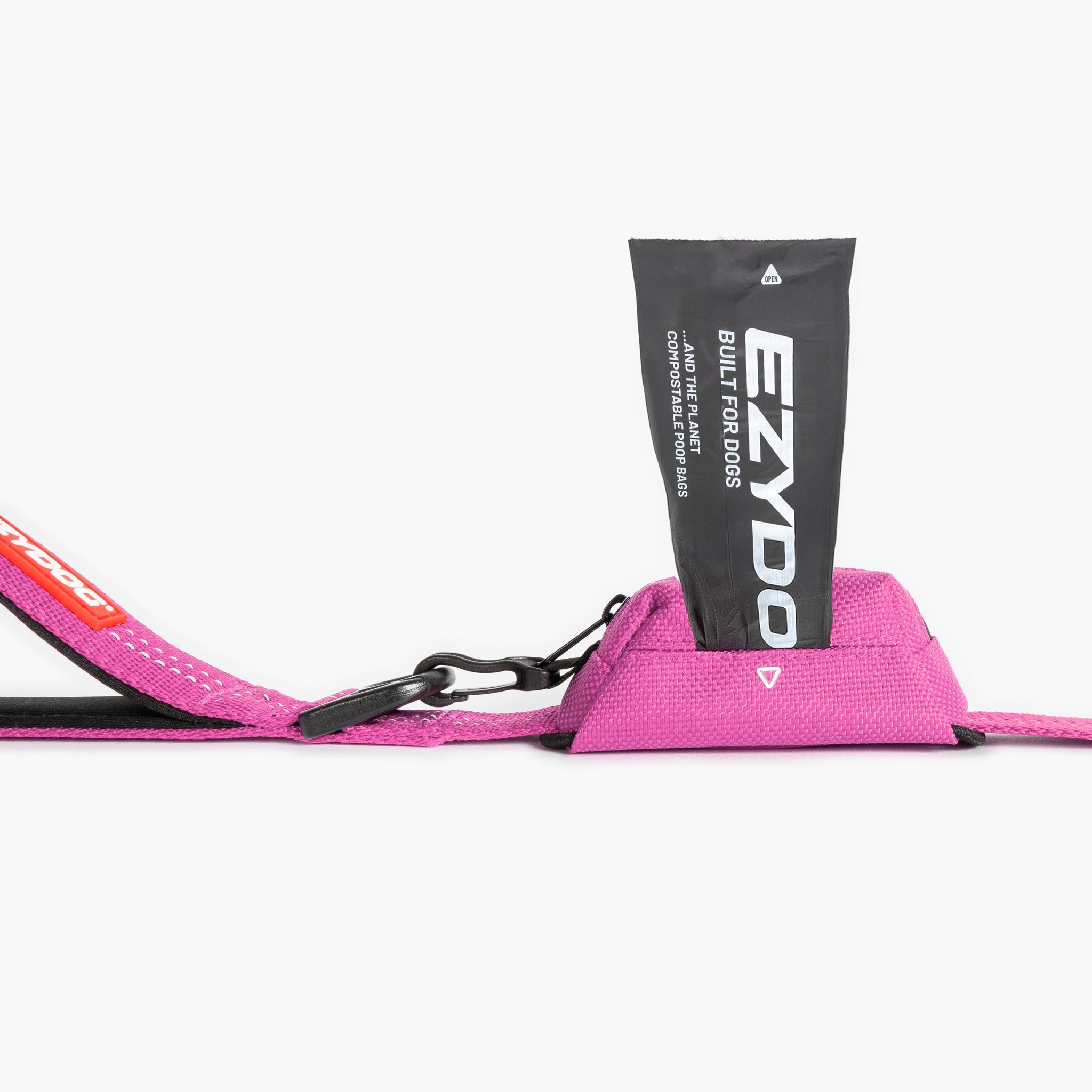 Pink Essential Dog Poop Bag Holder with a black pouch labeled 'EZYDOG' on a white background