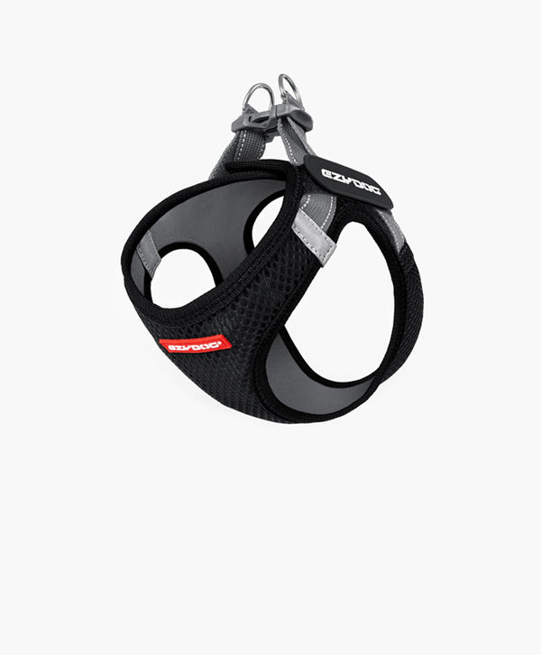 Black dog harness with EzyDog logo on a white background