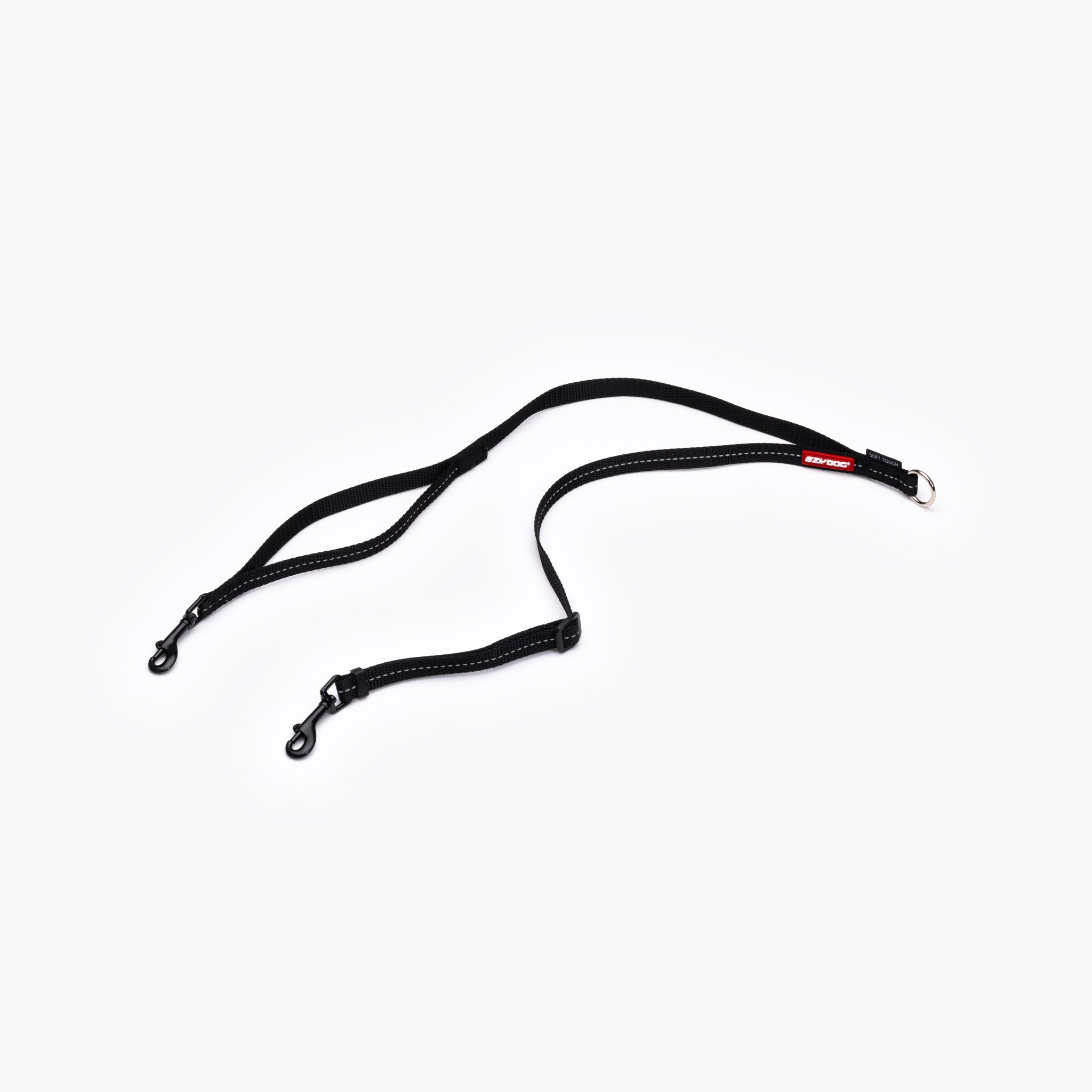 A black EzyDog Soft Touch Coupler LITE for walking two small dogs, featuring adjustable straps and reflective trim.