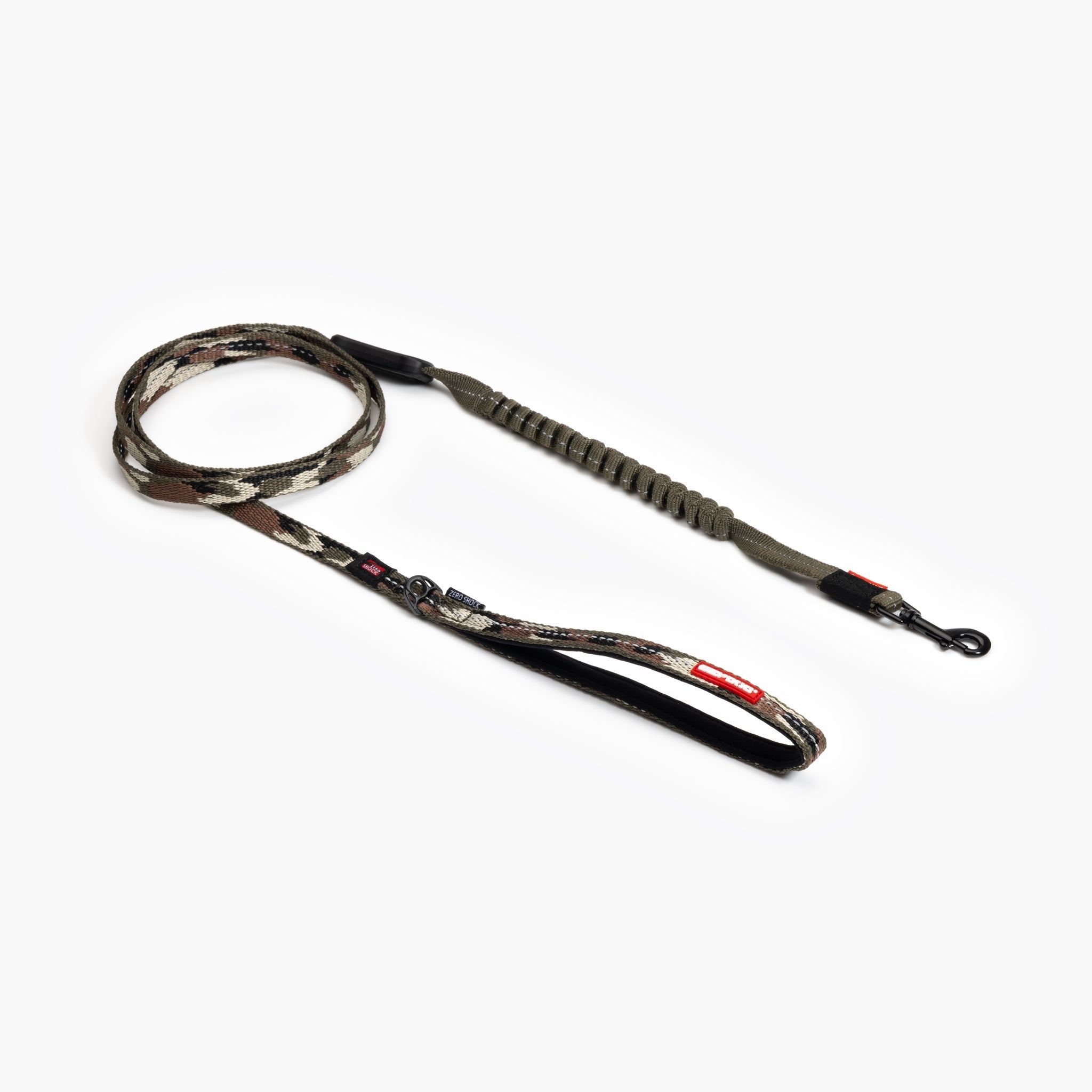 A camo-patterned dog leash with a shock-absorbing section in the middle, featuring a comfortable grip handle and reflective trim.