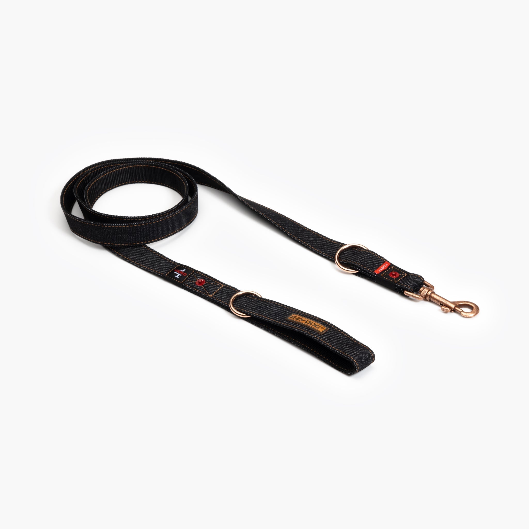 A black Vario 4 Multi-Function Dog Lead with a denim pattern, featuring adjustable straps and metal clasps.